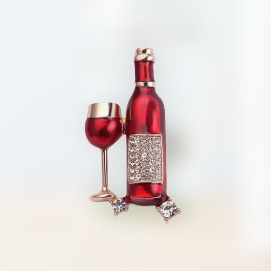 Sparkling rhinestone wine bottle and wine, glass metal brooch. Gold and red.