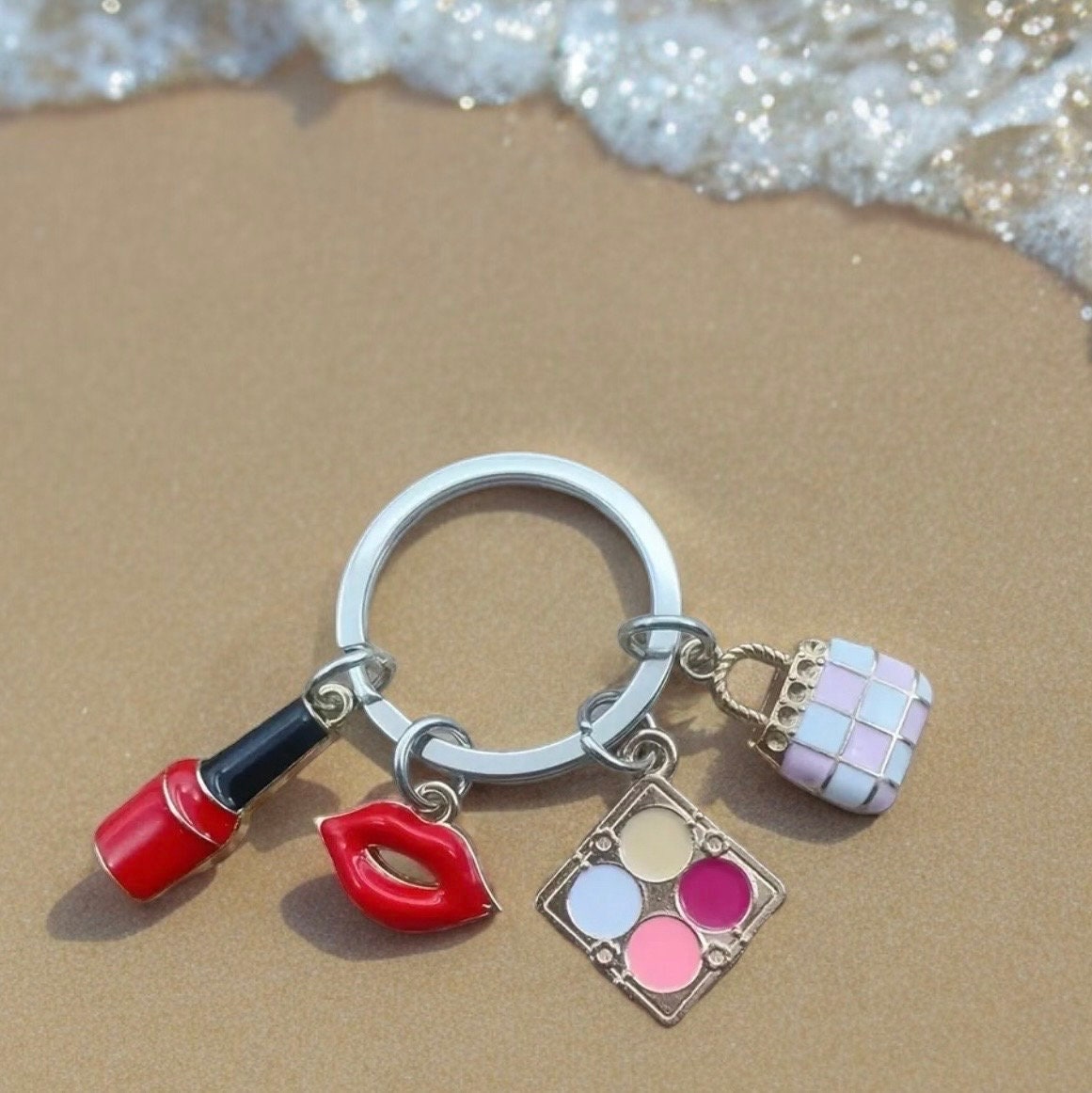 Nail Polish, Red Lips, Eye Shadow, Purse, Pendant Keychain is a stylish and practical accessory for anyone who loves to accessorize.